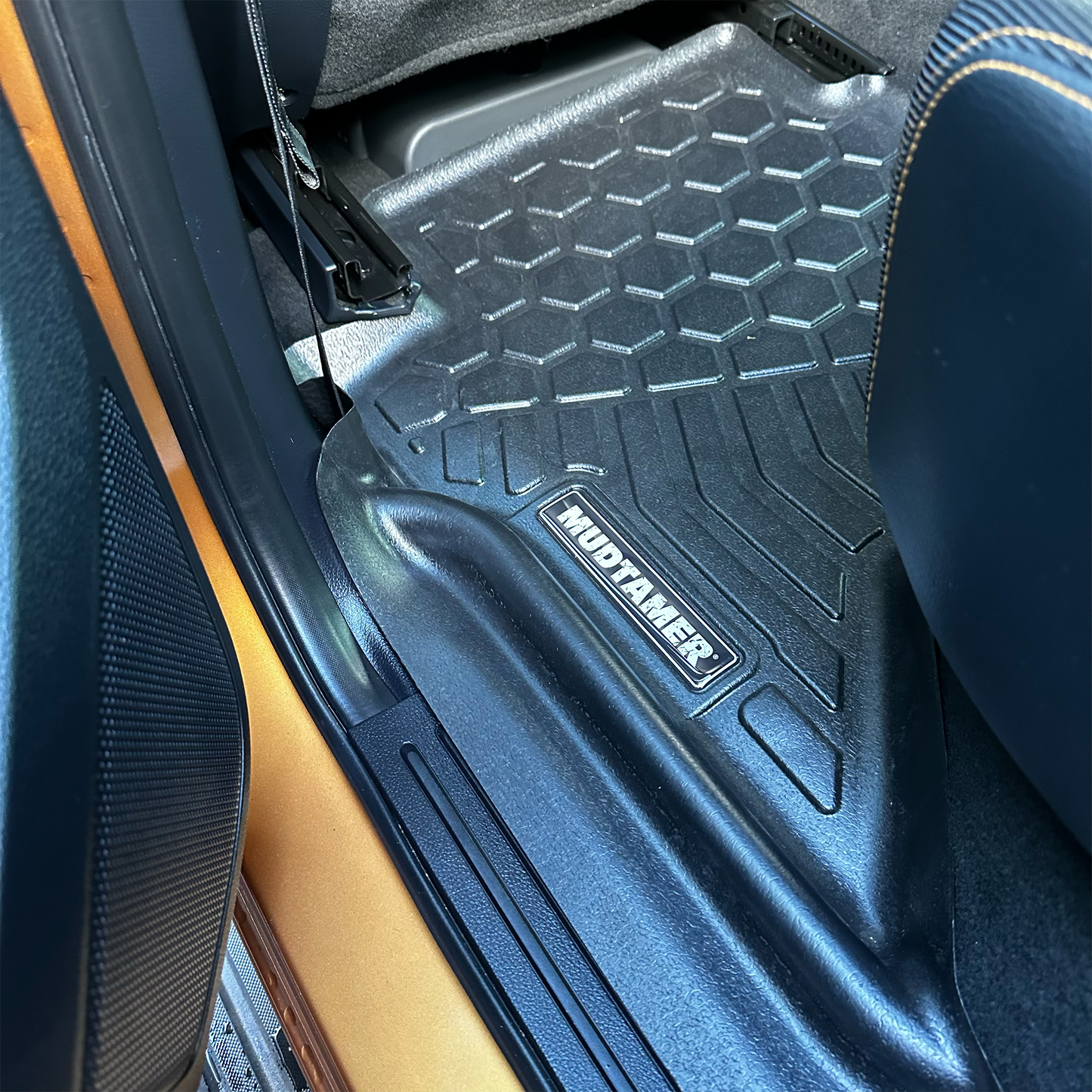 Rear MUDTAMER floor mat installed in vehicle