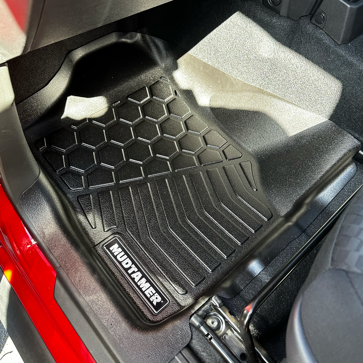Front passenger side MUDTAMER floor mat installed in a Suzuki Jimny