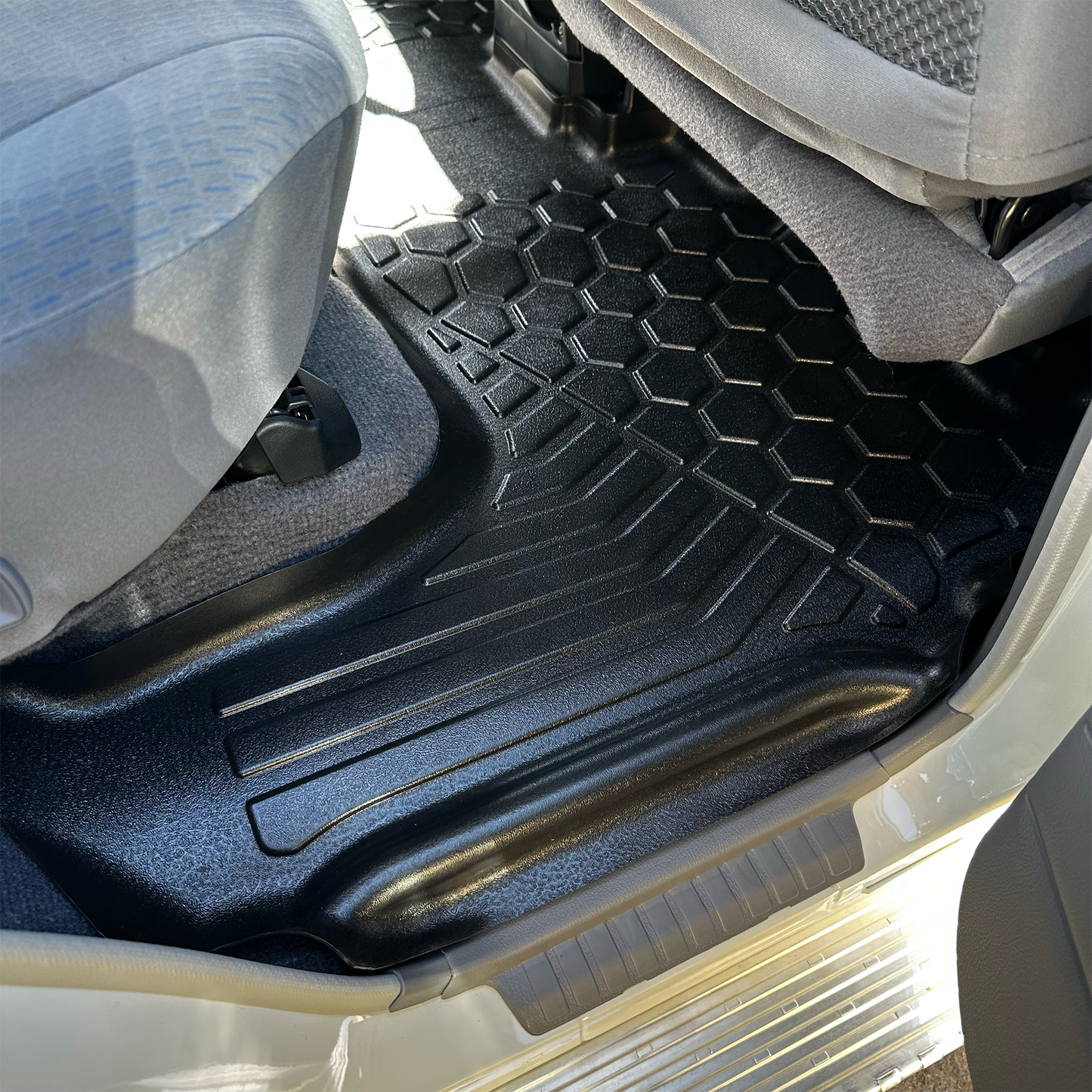 Rear set of MUDTAMER floor mats installed in a Toyota Landcruiser 79 Series Dual Cab
