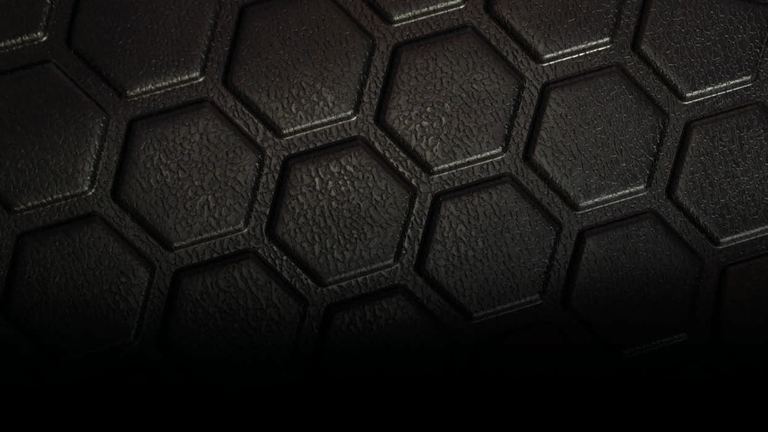 Close up of the honeycomb pattern found on the MUDTAMER floor mats