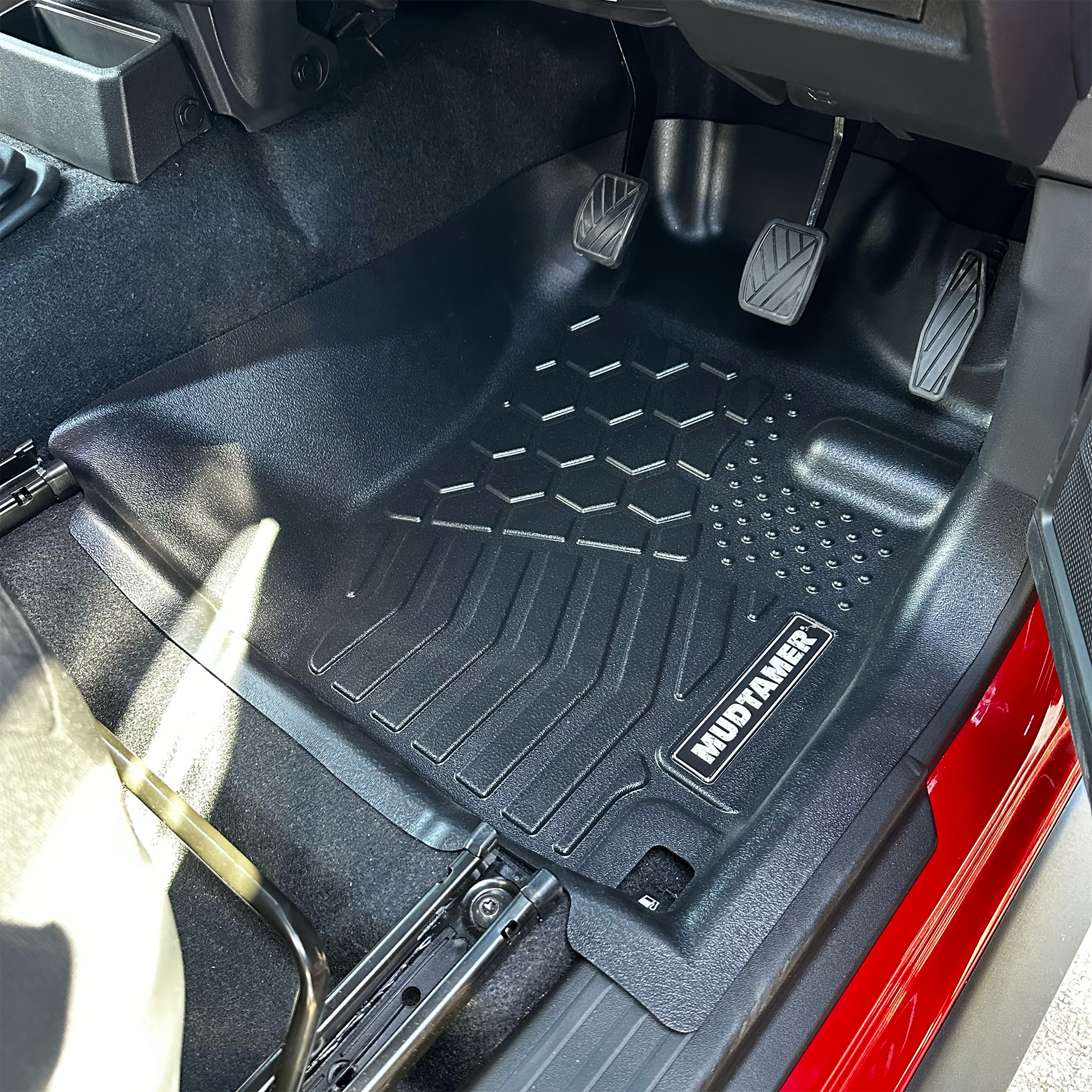 Front driver's MUDTAMER floor mat installed in a Suzuki Jimny